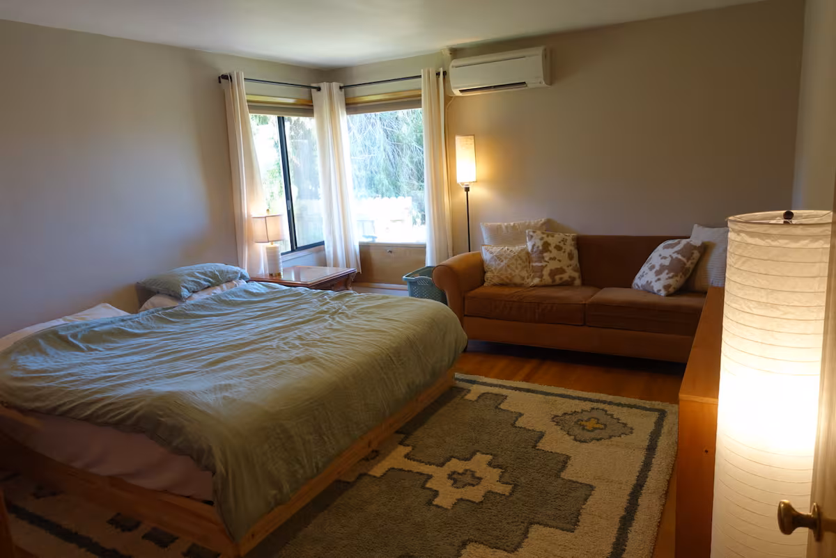 Mid-century home bedroom with sitting area